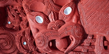 New Zealand Small Group Golf Tour Vacation Package Maori carving in Rotorua, New Zealand - PerryGolf + Azamara Cruises